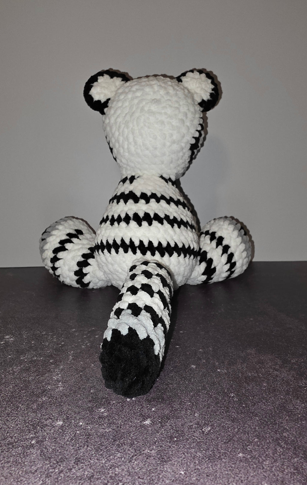 Peluche de tigre tierno con ojos negros