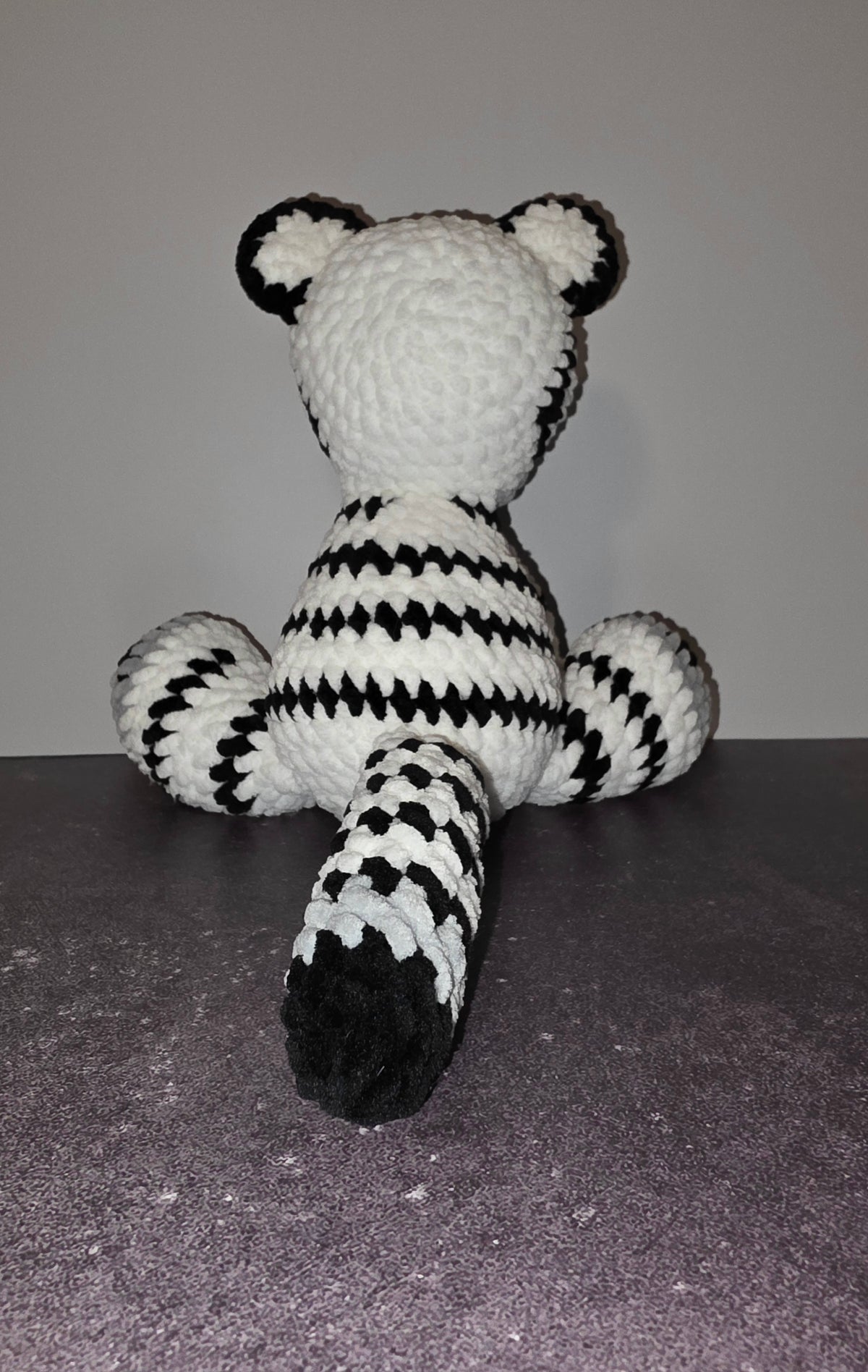 Peluche de tigre tierno con ojos negros
