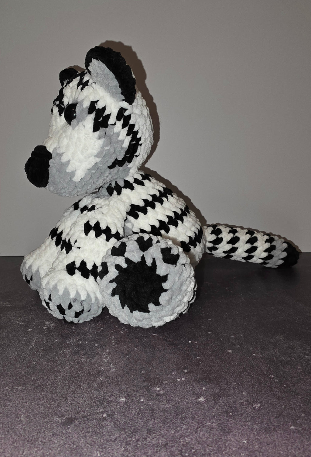 Peluche de tigre tierno con ojos negros