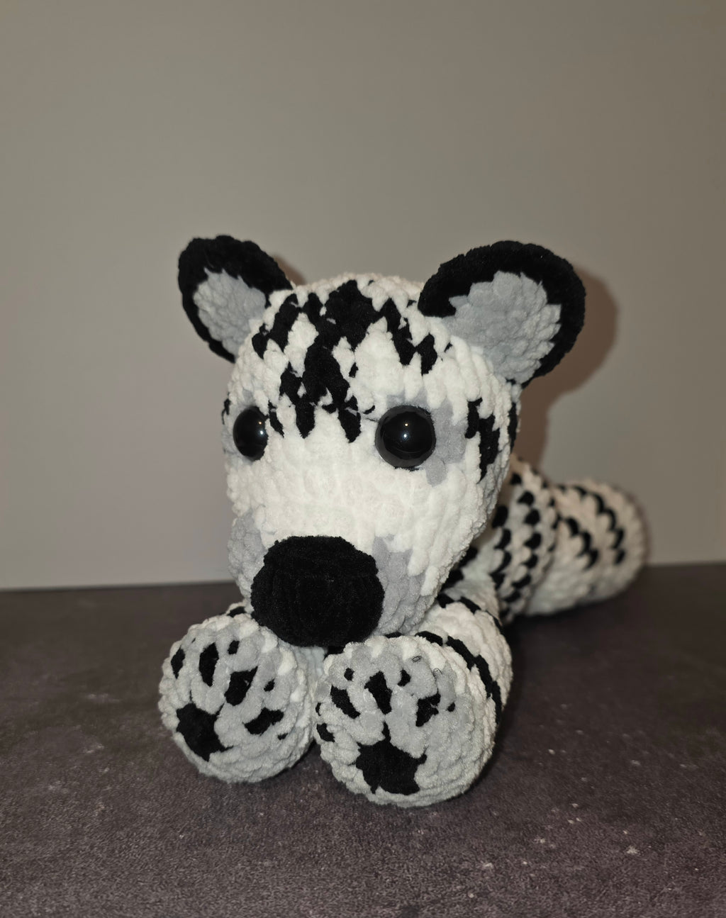 Peluche de tigre tierno con ojos negros
