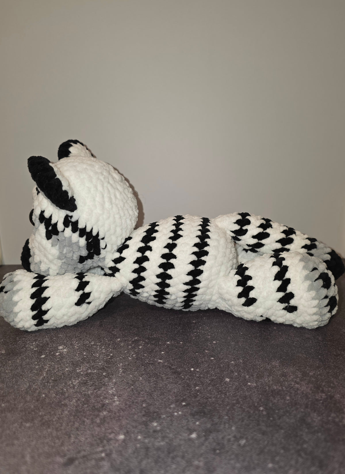 Peluche de tigre tierno con ojos negros